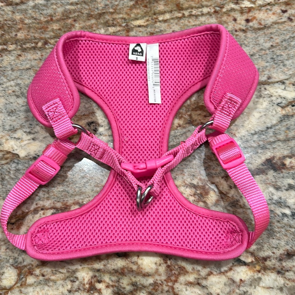 Dog harness thoroughly cleaned - worn once.